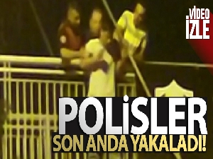 Üst geçitten atlamak üzere olan genci polisler son anda yakaladı