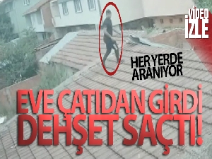 Çatıdan eve girerek husumetlisinin eşini darp etti