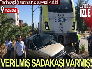 Yaşlı adam trenin çarptığı otomobilden sağ çıktı
