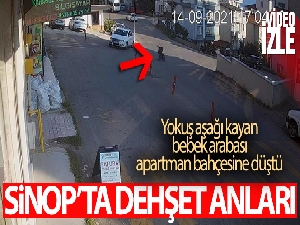 Sinop'ta dehşet anları: Yokuş aşağı kayan bebek arabası apartman bahçesine düştü
