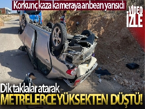 Dik bir şekilde taklalar atarak bariyerleri aşan araç, 3 metre yükseklikten aşağı düştü