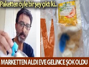 Marketten aldığı peynirin içinden eldiven çıktı