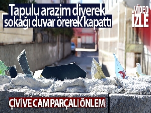 Tapulu arazim diyerek sokağı duvar örerek kapattı