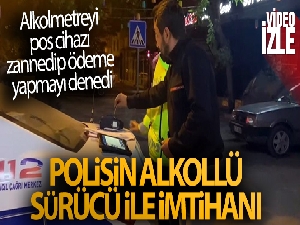 Alkollü sürücünün Alkolmetreyi pos cihazı zannedip ödeme yapmayı denemesi gülümsetti