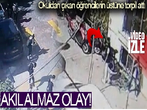 Okuldan çıkan öğrencilerin üstüne torpil attı