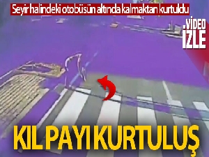 Otobüsün altında kalmaktan son anda kurtuldu