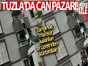 Tırın üzerinden balkona merdiven uzattılar, mahsur kalanları kurtardılar