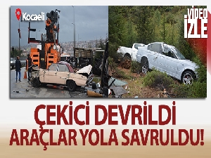 Arızalanan aracı yolcularla birlikte taşıyan çekici TEM'de devrildi