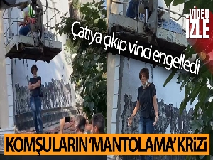 Maltepe'de komşuların ‘mantolama' krizi: Çatıya çıkıp vinci engelledi