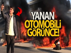 Kadıköy'de yanan otomobili arkasına alıp selfie çekti
