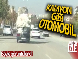 Otomobiline adeta kamyon gibi yük yükledi