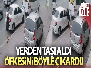 Eşiyle tartıştı, öfkesini arabasından çıkardı: O anlar güvenlik kamerasında
