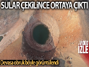 Sular çekilince ortaya çıkan devasa obruk drone ile görüntülendi