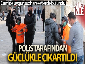 Camide uygunsuz hareketlerde bulunan Rus kadın, polis tarafından güçlükle çıkartıldı