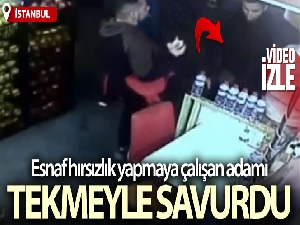 Kadın müşterisinin telefonunu çalmaya çalışan hırsızı tekmeyle savuşturdu