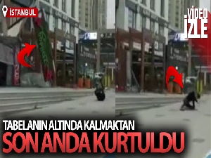 Uçan tabelanın altında kalmaktan son anda böyle kurtuldu