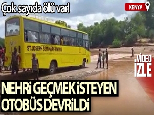 Kenya'da taşan nehri geçmek isteyen otobüs devrildi