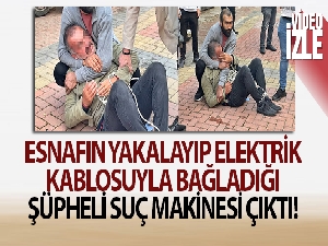 Esnafın yakalayıp elektrik kablosuyla bağladığı şüpheli suç makinesi çıktı