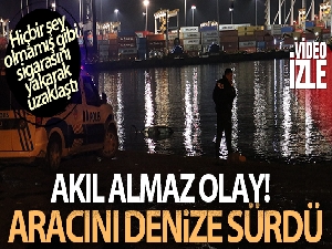 Aracını denize sürdü, hiçbir şey olmamış gibi sigarasını yakarak uzaklaştı