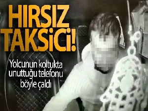 Yolcunun koltukta unuttuğu telefonu çalan taksici kamerada