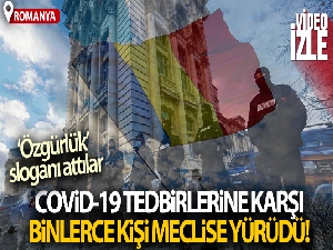 Romanya'da Covid-19 tedbirlerine karşı binlerce kişi Meclise yürüdü