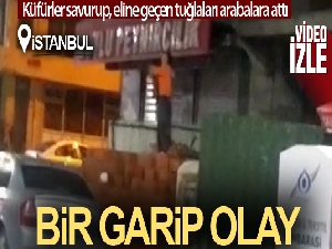 İnşaata giren kadın üzerine çıktığı tuğlaları park halindeki araçlara attı