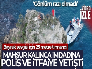 Bayrak sevgisiyle çıktığı 25 metrelik kayalıklarda mahsur kaldı