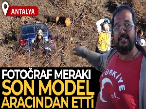 Fotoğraf çekmek isterken son model aracından oldu