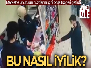 Markette unutulan cüzdanın içini boşaltıp geri getirdi