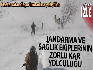 Karla kaplı köy yolunu aşıp hastayı helikoptere yetiştirdiler