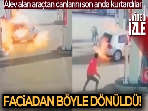 Alev alan araçtan canlarını son anda kurtardılar