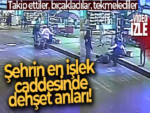 Ellerinde bıçaklar ile takip ettikleri iki kişiyi bıçakladılar, yerde tekmelediler