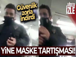 Marmaray'da maske takmayan yolcularla güvenliğin tartışması kamerada