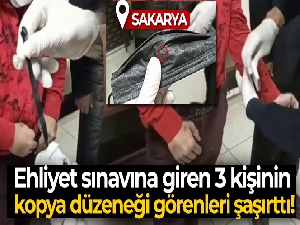 Ehliyet sınavına giren 3 kişinin kopya düzeneği görenleri şaşırttı
