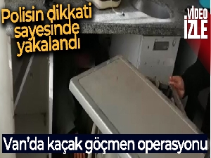 Çamaşır makinesinin arkasına saklanan göçmen böyle yakalandı