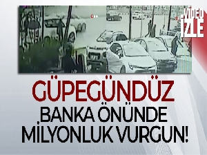 Güpegündüz banka önünde milyonluk vurgun: 100 bin dolar çaldılar