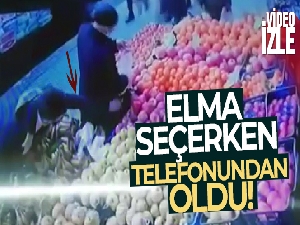 Elma seçerken telefonundan oldu