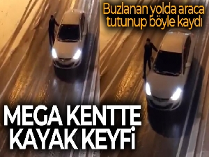 İstanbul'da 'kayak keyfi'...Buzlanan yolda araca tutunup böyle kaydı