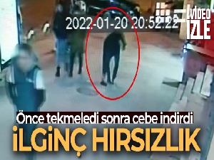 Yere düşürülen para dolu poşeti ayağıyla iterek el çabukluğuyla çaldı