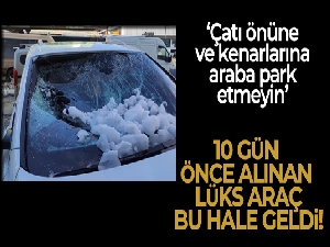 Sultangazi'de çatıdan düşen kar yığını lüks otomobile zarar verdi