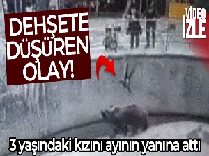 Özbekistan'da anne 3 yaşındaki kızını ayının yanına attı