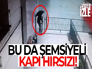 Şemsiyeli kapı hırsızı kamerada
