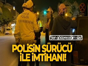 Polisin sürücü ile imtihanı kamerada