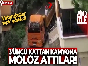 Üsküdar'da 3'üncü kattan kamyona moloz attılar, vatandaşlar tepki gösterdi