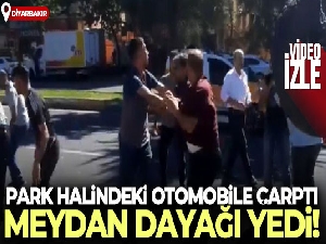 Hem park halindeki otomobile çarptı, hem de meydan dayağı yedi