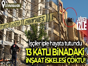 13 katlı binadaki inşaat iskelesi çöktü, işçiler iple hayata tutundu