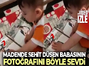 Madende şehit düşen babasının fotoğrafını böyle sevdi