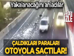 Şili'de polisten kaçan hırsızlar çaldıkları parayı otoyola saçtı
