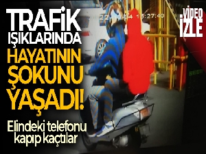 Trafik ışıklarında hayatının şokunu yaşadı, elindeki telefonu kapıp kaçtılar