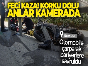 Otomobile çarparak bariyerlere savrulan motosiklet sürücüsü kamerada